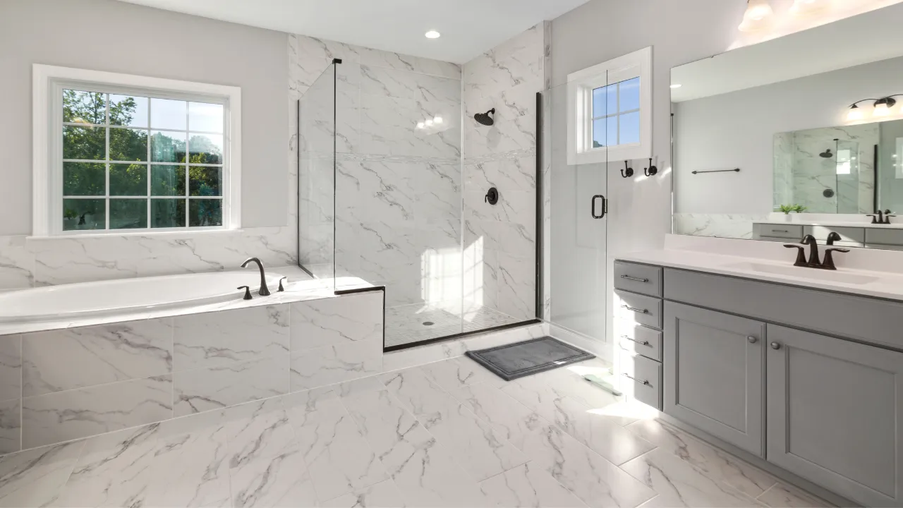 Remodeled bathroom with new tile and flooring in an Angier, NC home