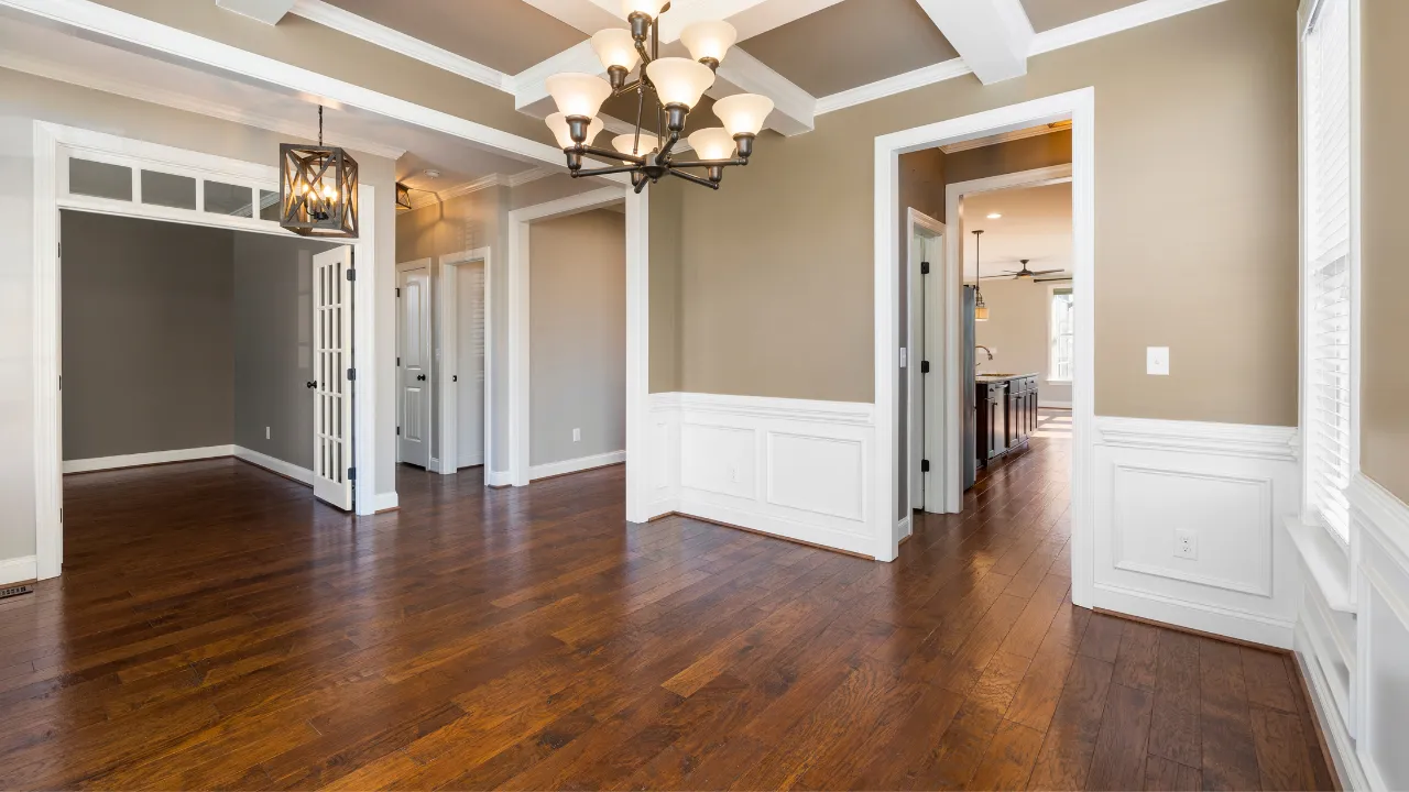 Wide-plank hardwood flooring professionally installed in a central North Carolina living room