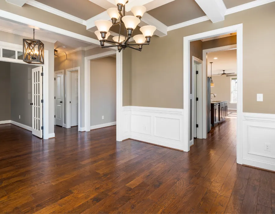 Protective checkmark shield over a home - the APW satisfaction guarantee
